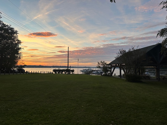 Rugby Hall marina waterfront and pavilion at sunset